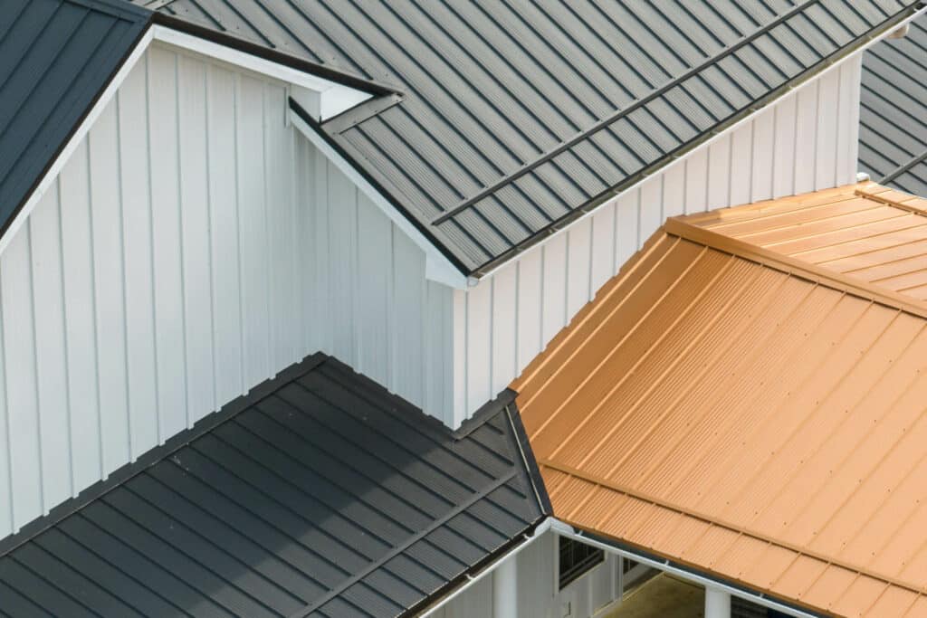 Dark metal roof on a white house 2