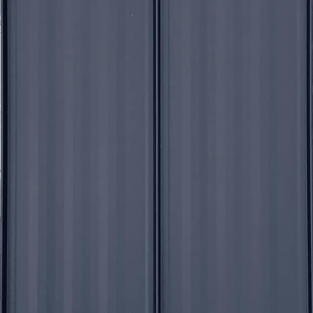 Close-up view of slate blue full striation standing seam metal roofing panels with vertical ribbed texture and a raised center seam dividing two panels.